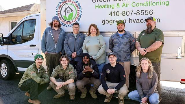 The Green Comfort Systems crew in front of a branded box truck in Rosedale