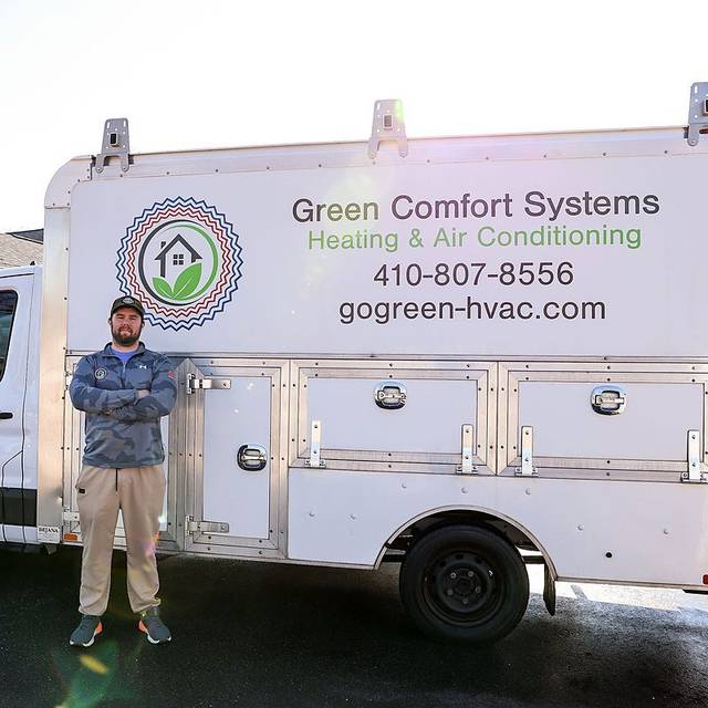 Green Comfort Systems branded service truck on a Baltimore job